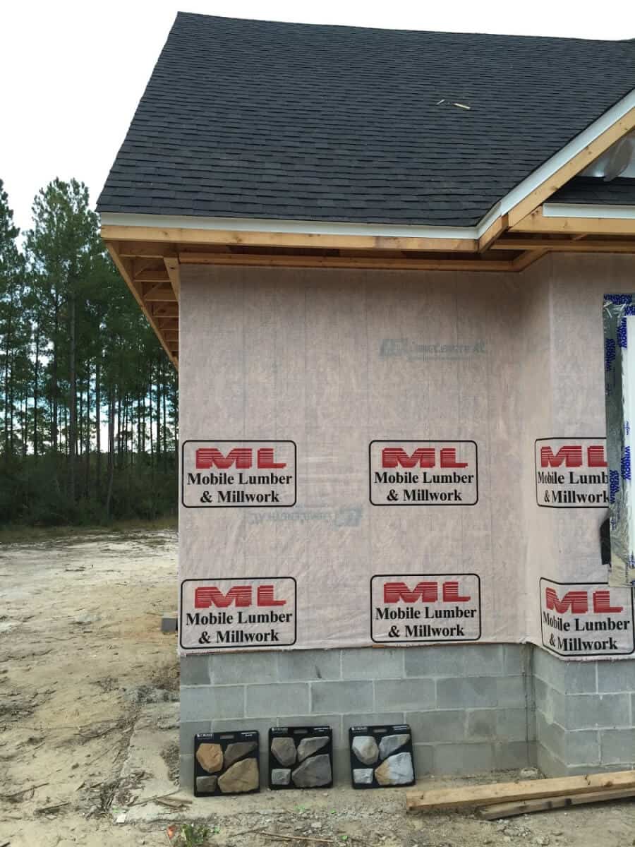 Newly built house with 3 small stone samples