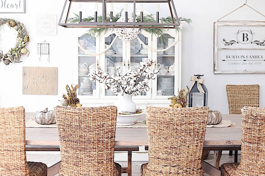 Farmhouse Dining Room with wicker chairs.