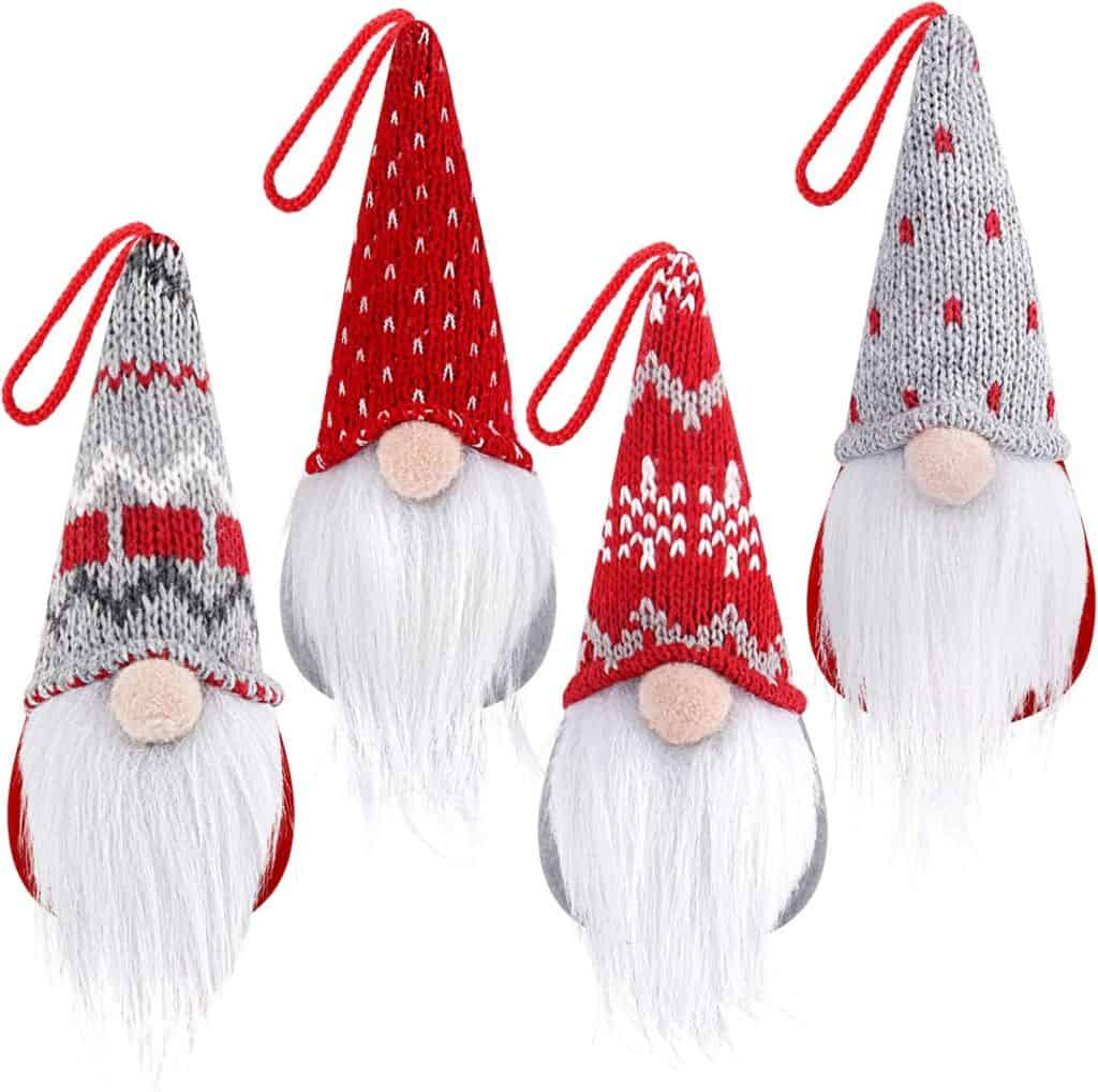 Red and gray Christmas gnome ornaments with knit hats – perfect holiday decor.