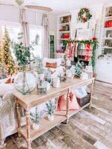 Festive holiday home decorated with Christmas trees and ornaments at the TRIBE OF BURTON.