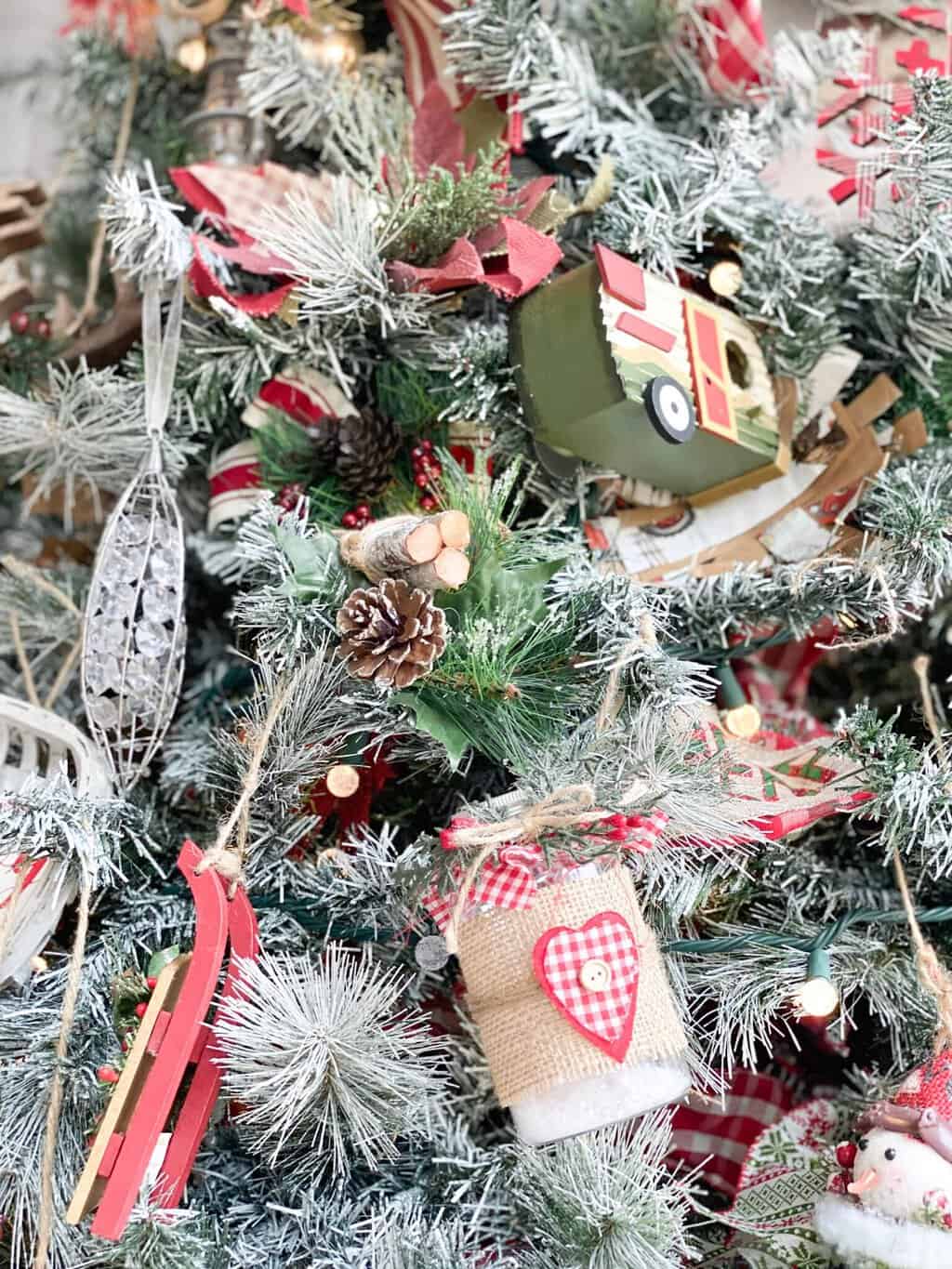 Flocked Christmas Tree with different Rustic Christmas Ornaments