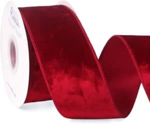 Luxurious red velvet ribbon for gift wrapping and holiday decorations.