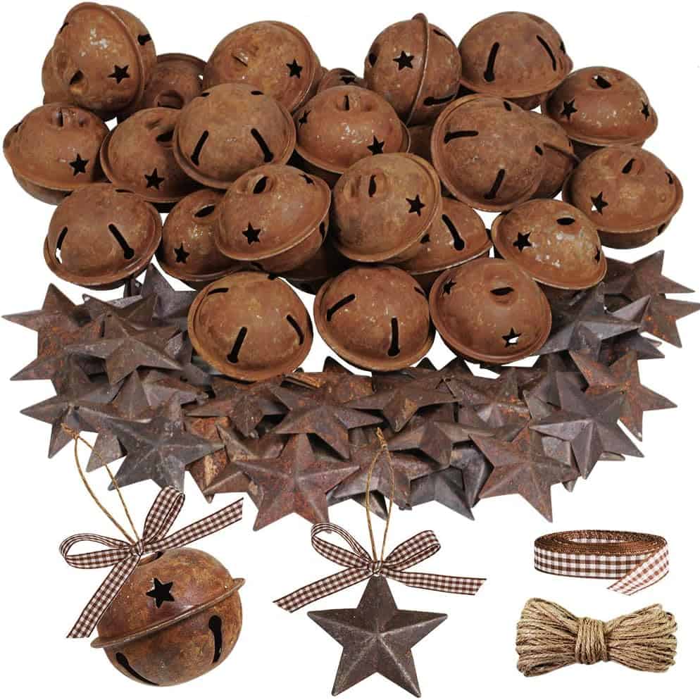 Rustic metal jingle bells with star-shaped cutouts for holiday decoration and festive crafts.