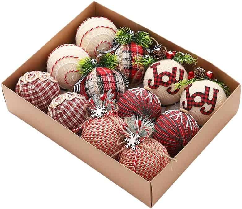 Festive Christmas ornaments in a gift box with plaid and holiday-themed designs, perfect for holiday decorating and home decor.