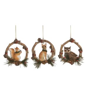 Woodland animal Christmas ornaments featuring a squirrel, dog, and owl with pinecone accents and rustic wreath designs.
