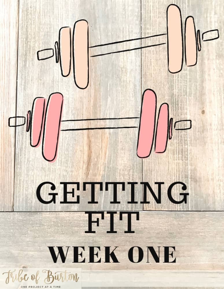 Pinterest Pin with dumbells and getting fit together with a wood background