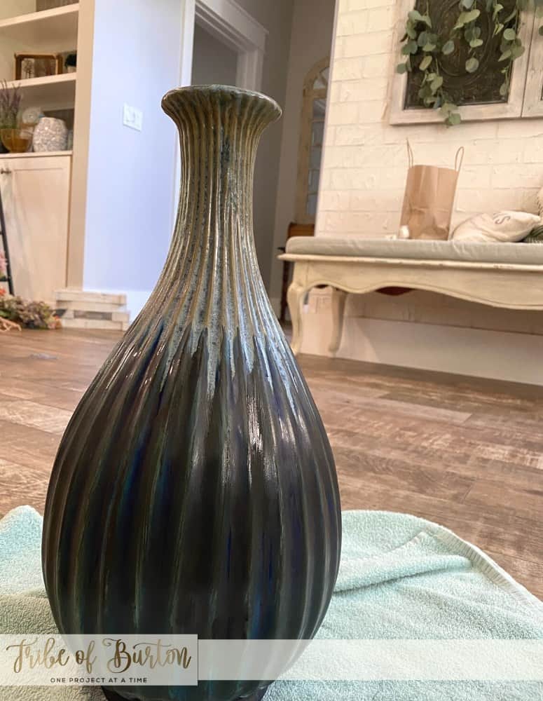 First coat of black chalk paint on vase. Waiting for it to dry