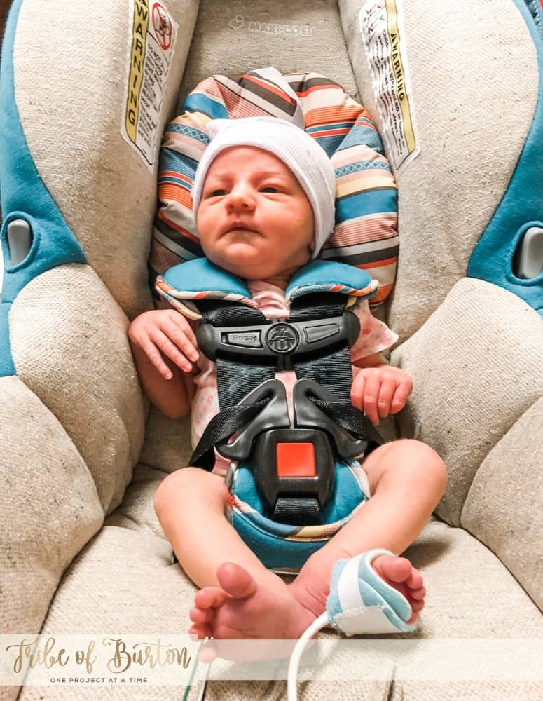 A baby doing a NICU Car Seat test to make sure oxygen levels stay up. 