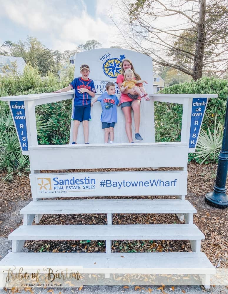 Kids in a big chair on vacation