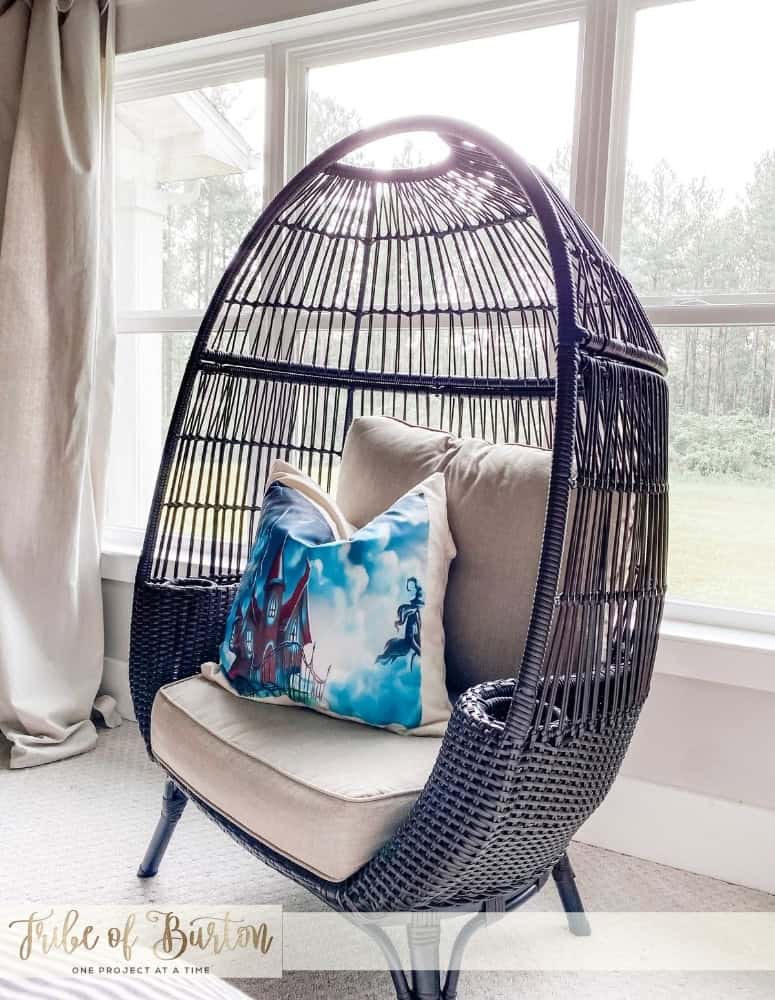 Halloween Pillow Case in master bedroom in chair by window.