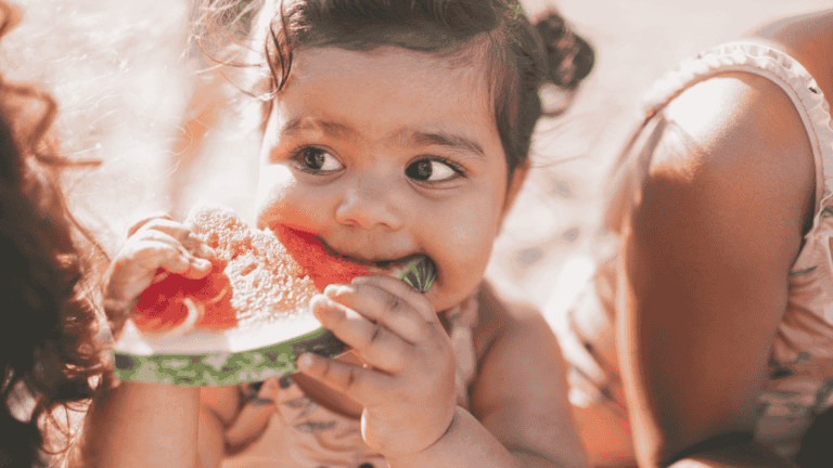 Child eating watermelon