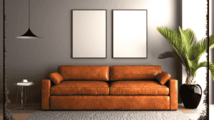 Modern living room with leather sofa, minimalist decor, and vibrant plant for stylish home interior.