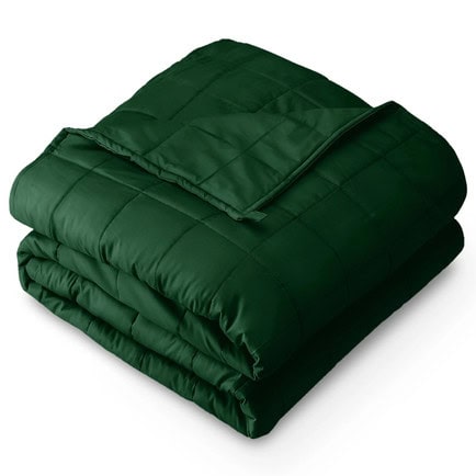 Luxurious green sleeping bag for outdoor camping and adventures.